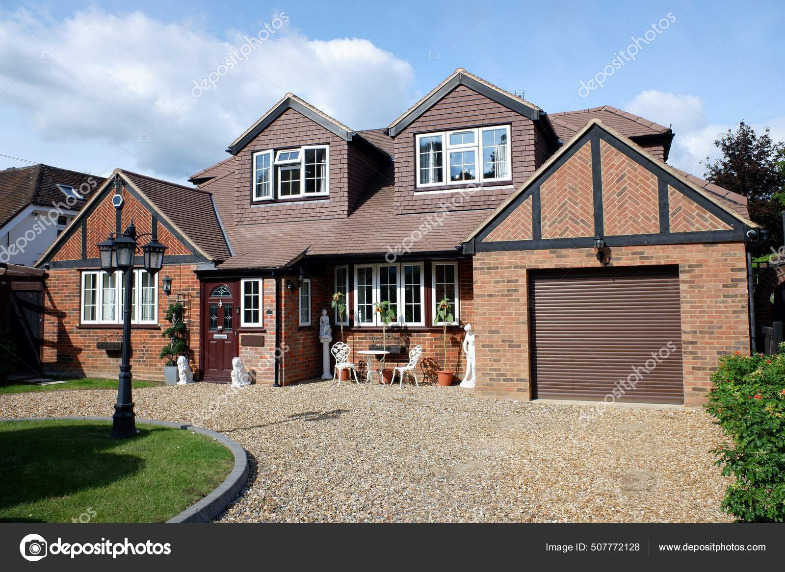 depositphotos_507772128-stock-photo-large-bungalow-property-integrated-garage