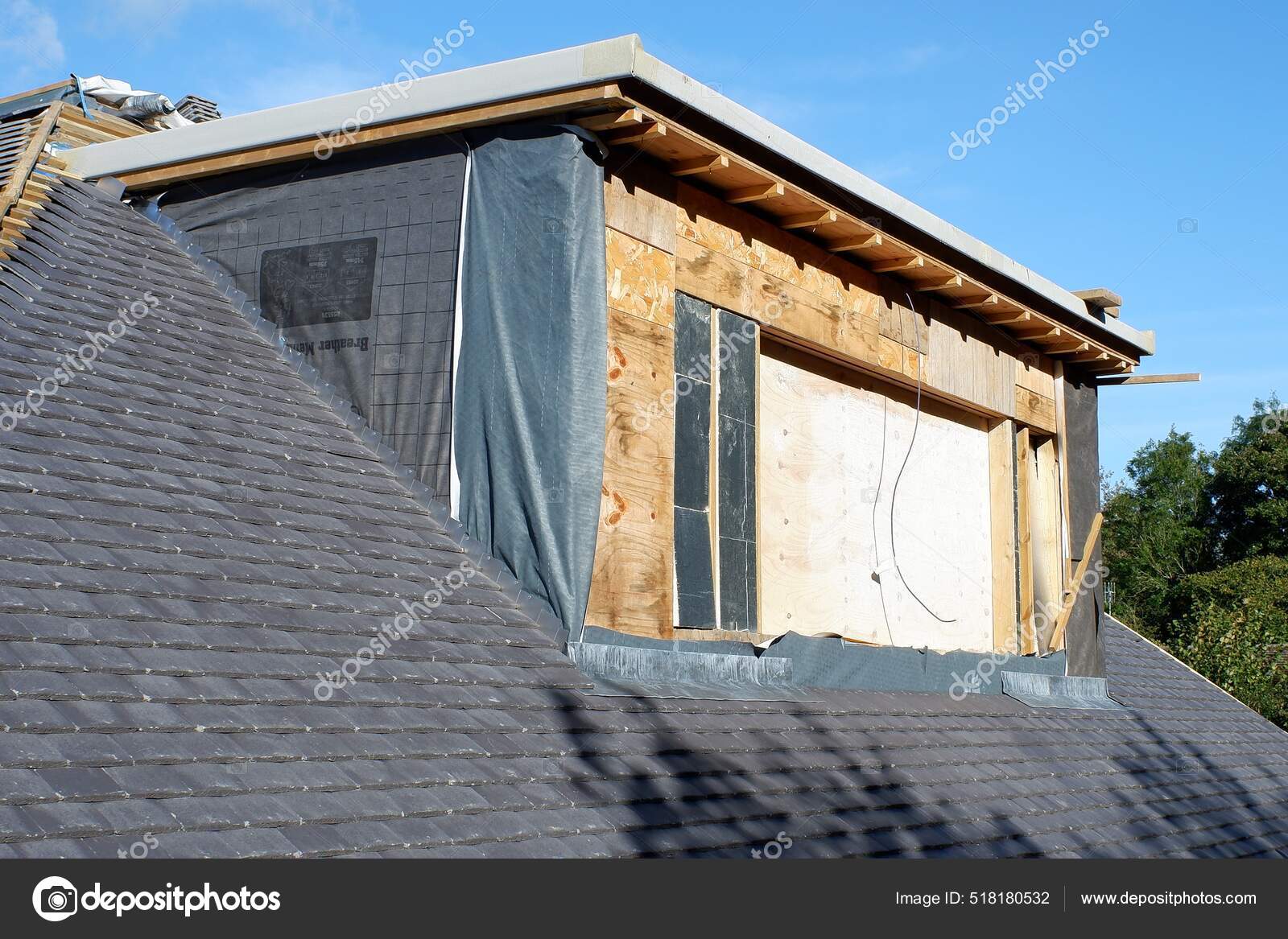 depositphotos_518180532-stock-photo-rear-dormer-slate-roof-new